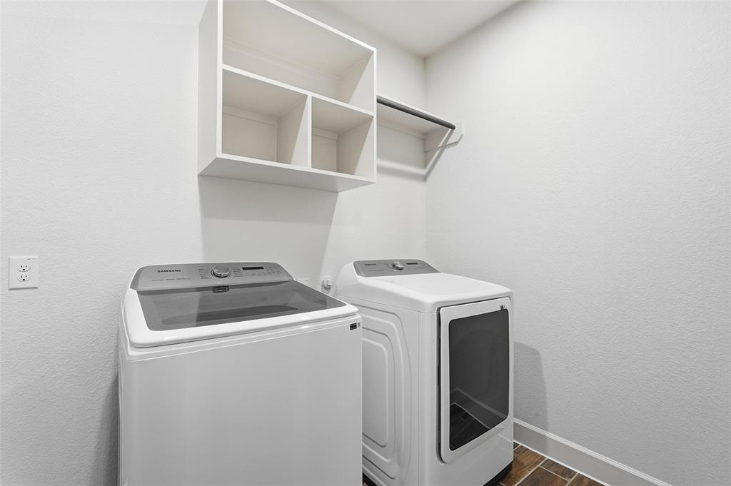 3329 Lacebark Lane Celina, TX 75009 - Photo 27 of 35 a utility room with dryer and washer