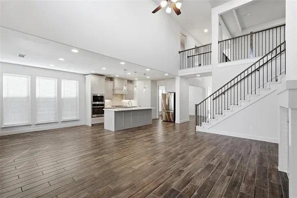 a view of kitchen with wooden floor