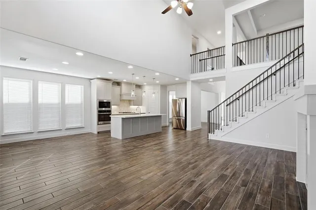 a view of kitchen with wooden floor