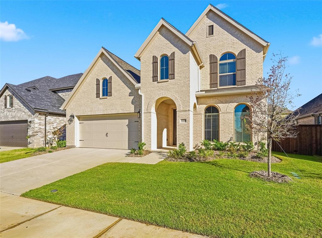 3329 Lacebark Lane Celina, TX 75009 - Photo 32 of 35 a front view of a house with garden