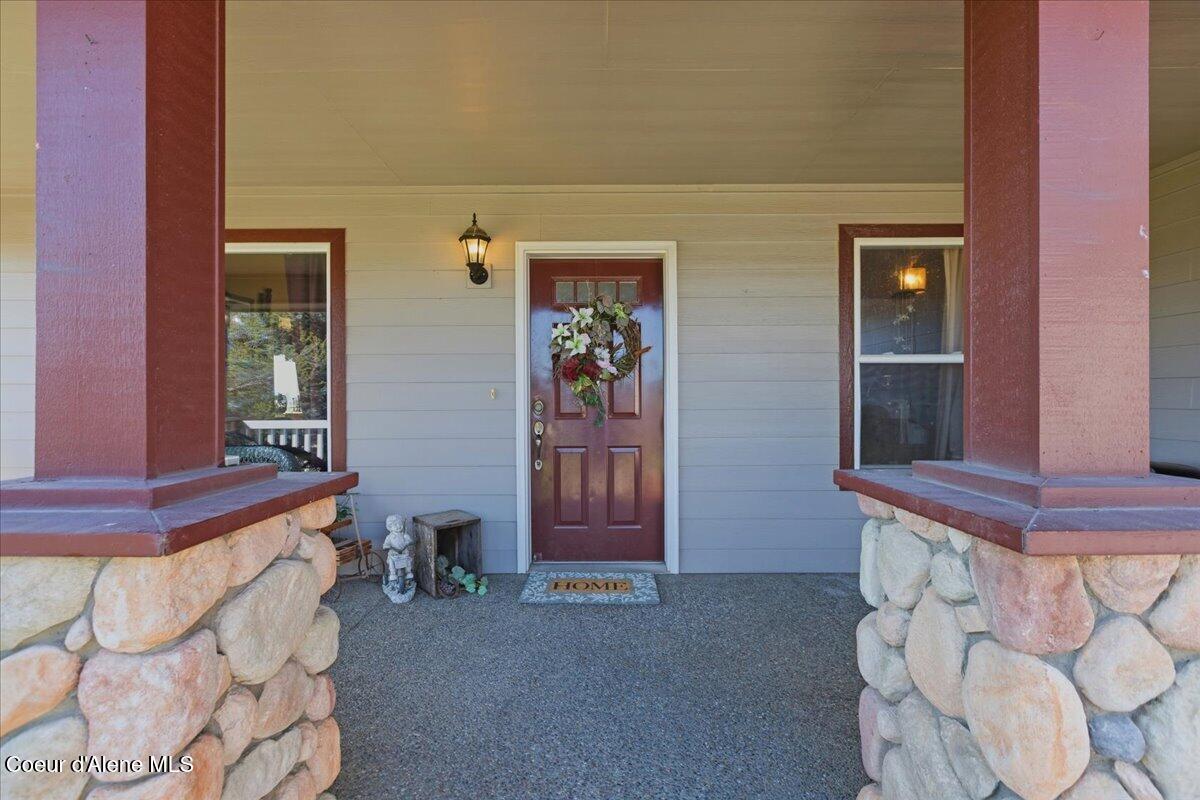 222 East Remington Road Athol, ID 83801 - Photo 55 of 78 Inviting Entry and Large Covered Porch