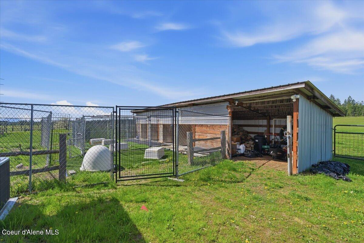 222 East Remington Road Athol, ID 83801 - Photo 58 of 73 Heated Kennels and Dog Runs