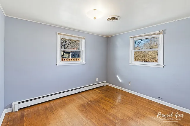 a backyard of a house with lots of green space