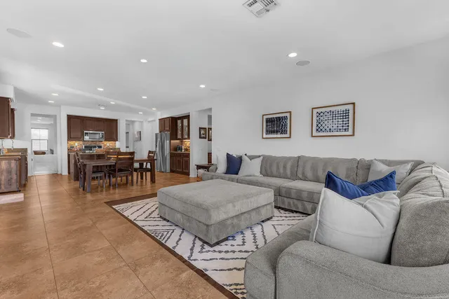a spacious bathroom with a sink mirror and a bathtub