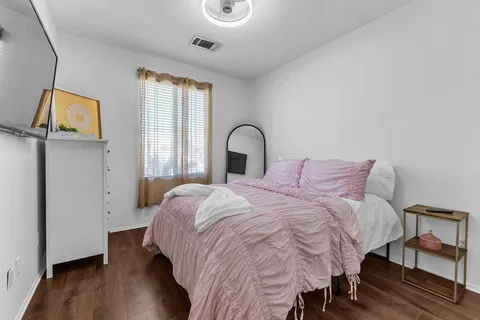a bathroom with a shower curtain and a sink