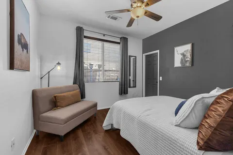 a patio with table and chairs