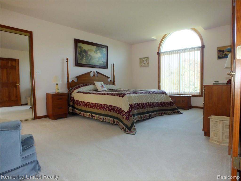 37297 Howard Road Farmington, MI 48331 - Photo 20 of 62 Master Bedroom with Double French Doors