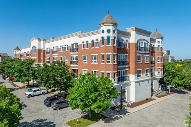 a front view of a building with garden