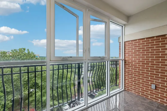 a view of a balcony with an outdoor space