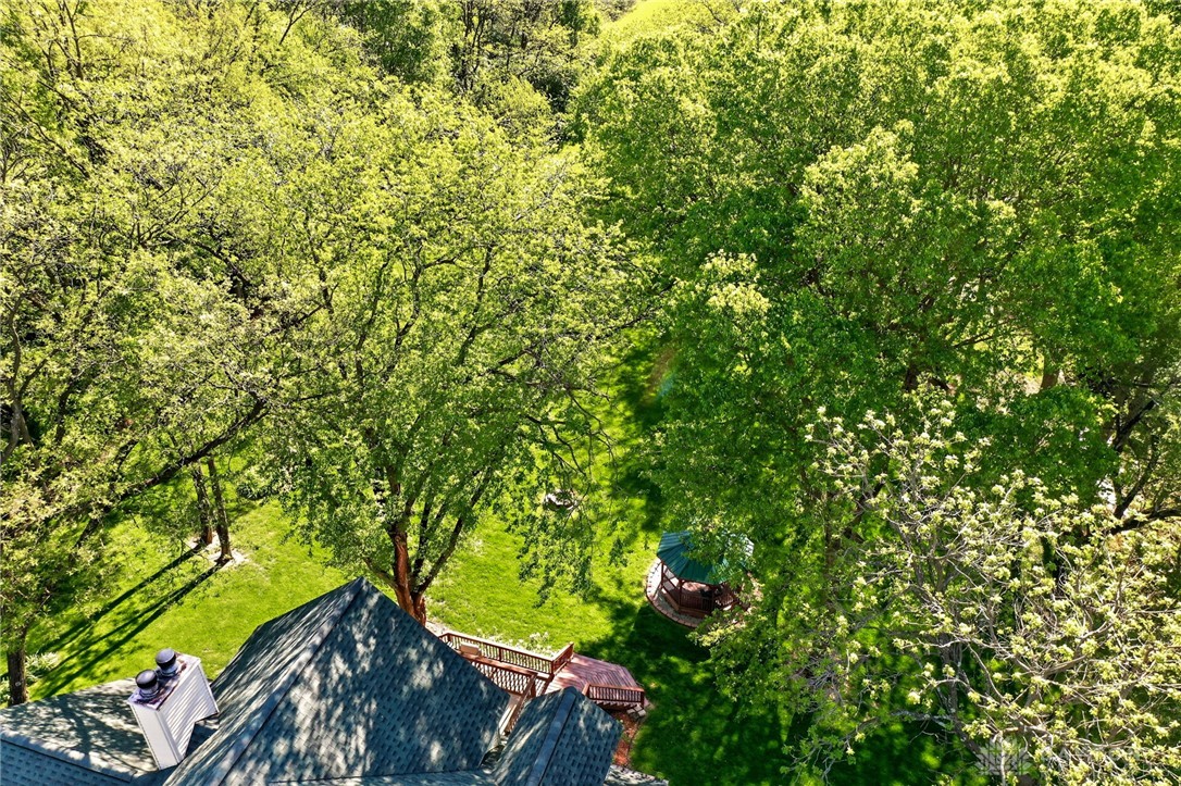 330 South Alpha Bellbrook Road Bellbrook, OH 45305 - Photo 78 of 87 An aerial view showcases verdant surroundings, a tranquil yard, and a house with a charming gazebo.
