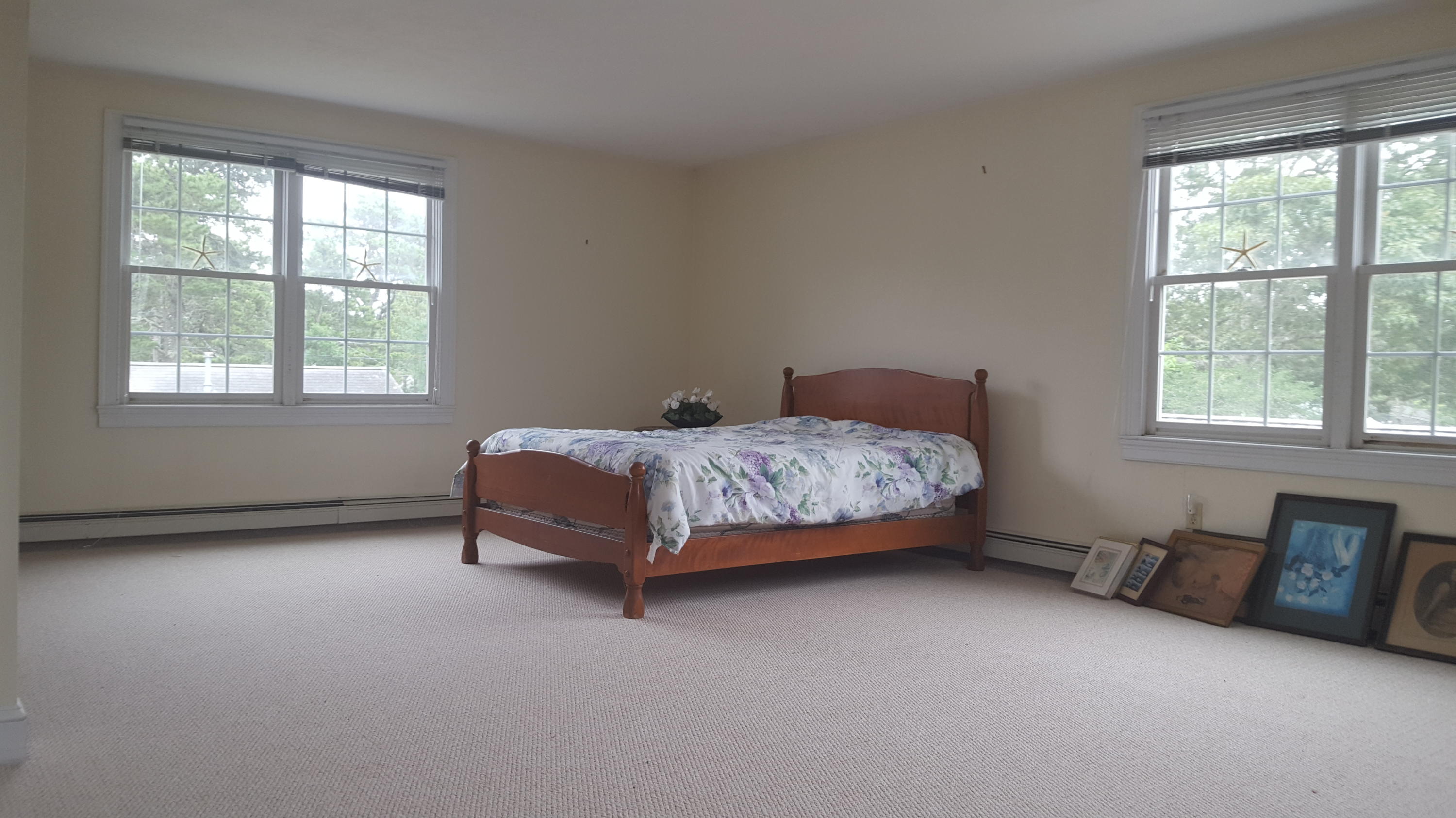 14 Bain Road Dennis Port, MA 02639 - Photo 13 of 22 a bedroom with a bed and a window