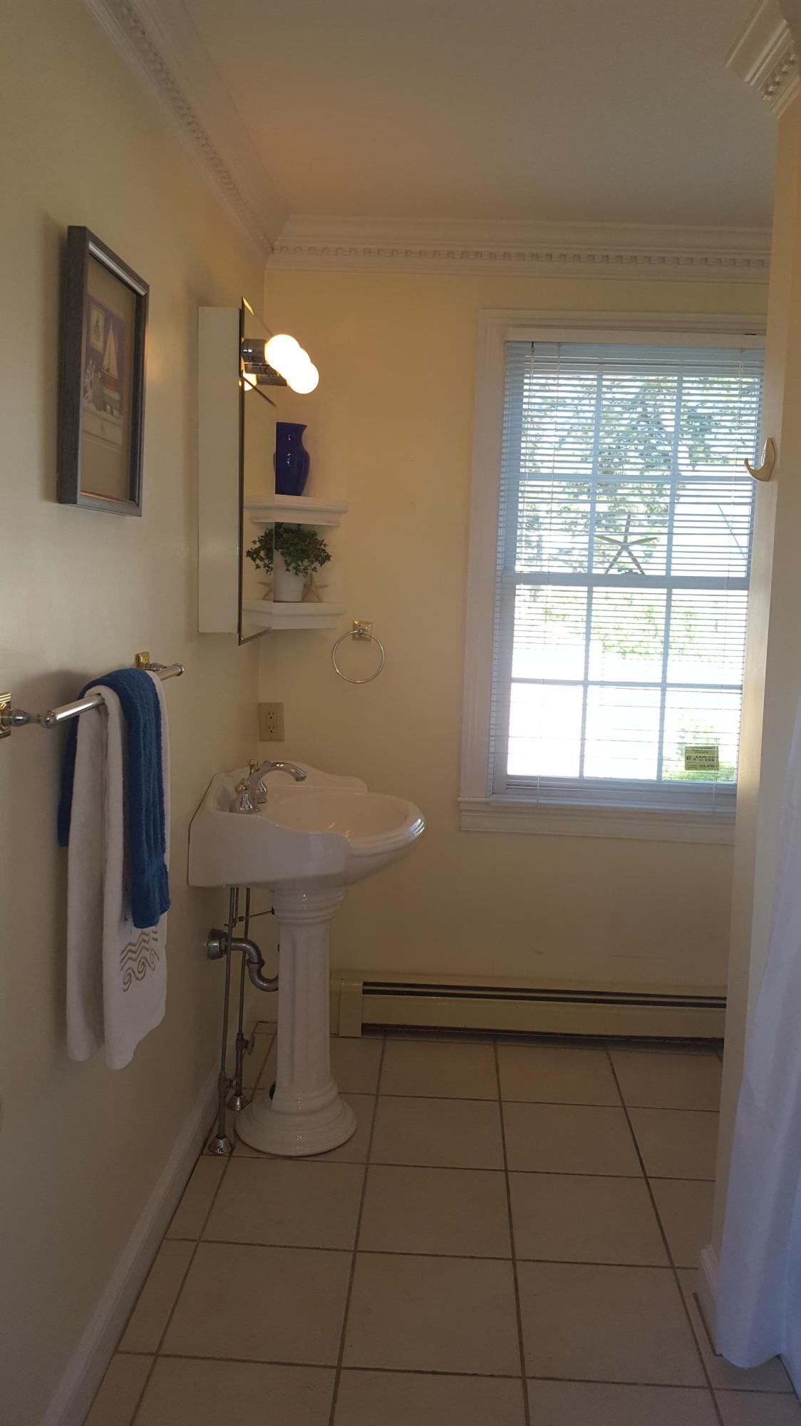 14 Bain Road Dennis Port, MA 02639 - Photo 14 of 22 a bathroom with a sink toilet and mirror