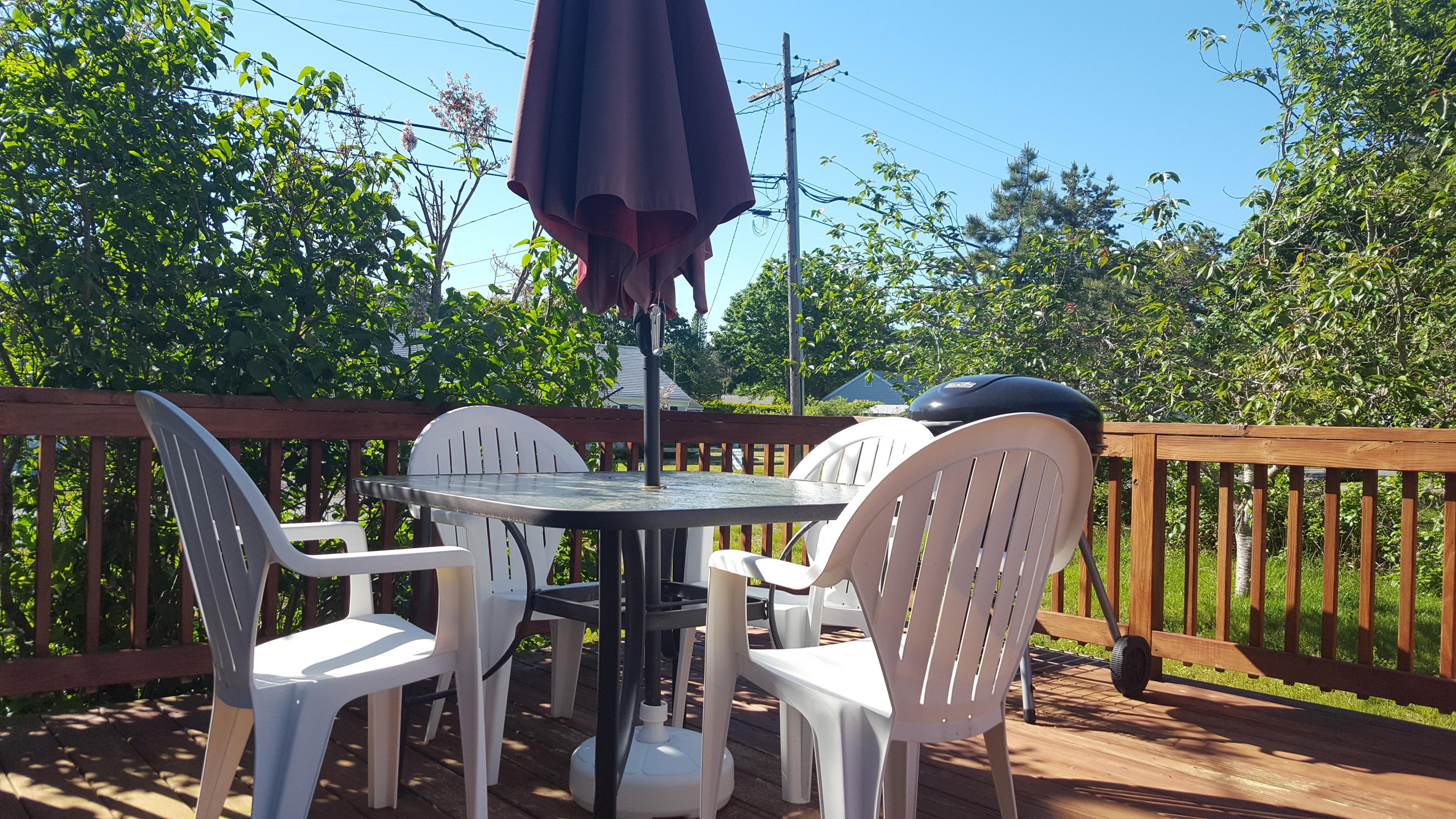 14 Bain Road Dennis Port, MA 02639 - Photo 16 of 22 a view of a chairs and table in the balcony