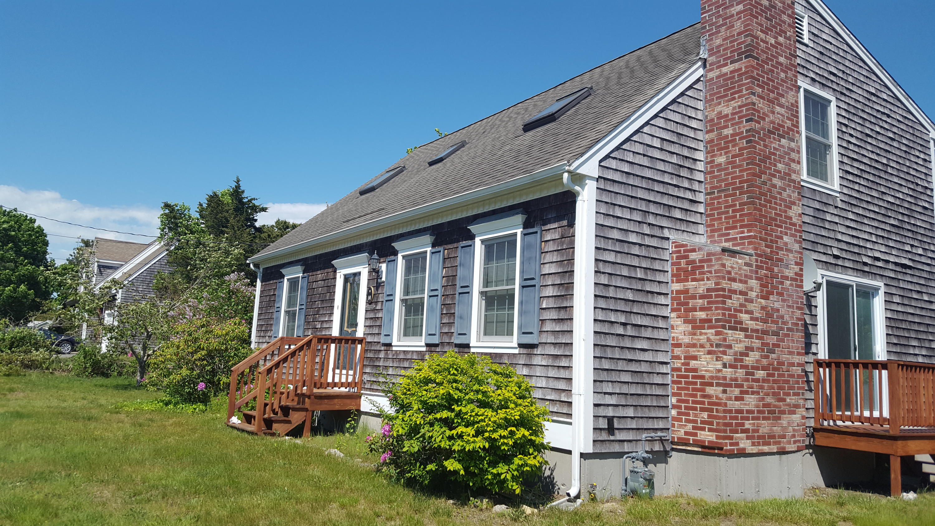 14 Bain Road Dennis Port, MA 02639 - Photo 17 of 22 a front view of a house with garden