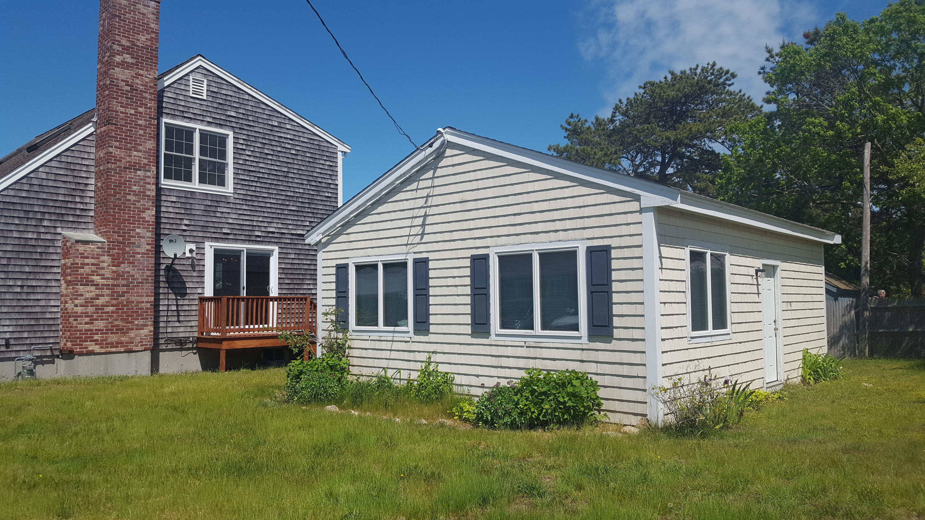 14 Bain Road Dennis Port, MA 02639 - Photo 18 of 22 a view of a house with a yard