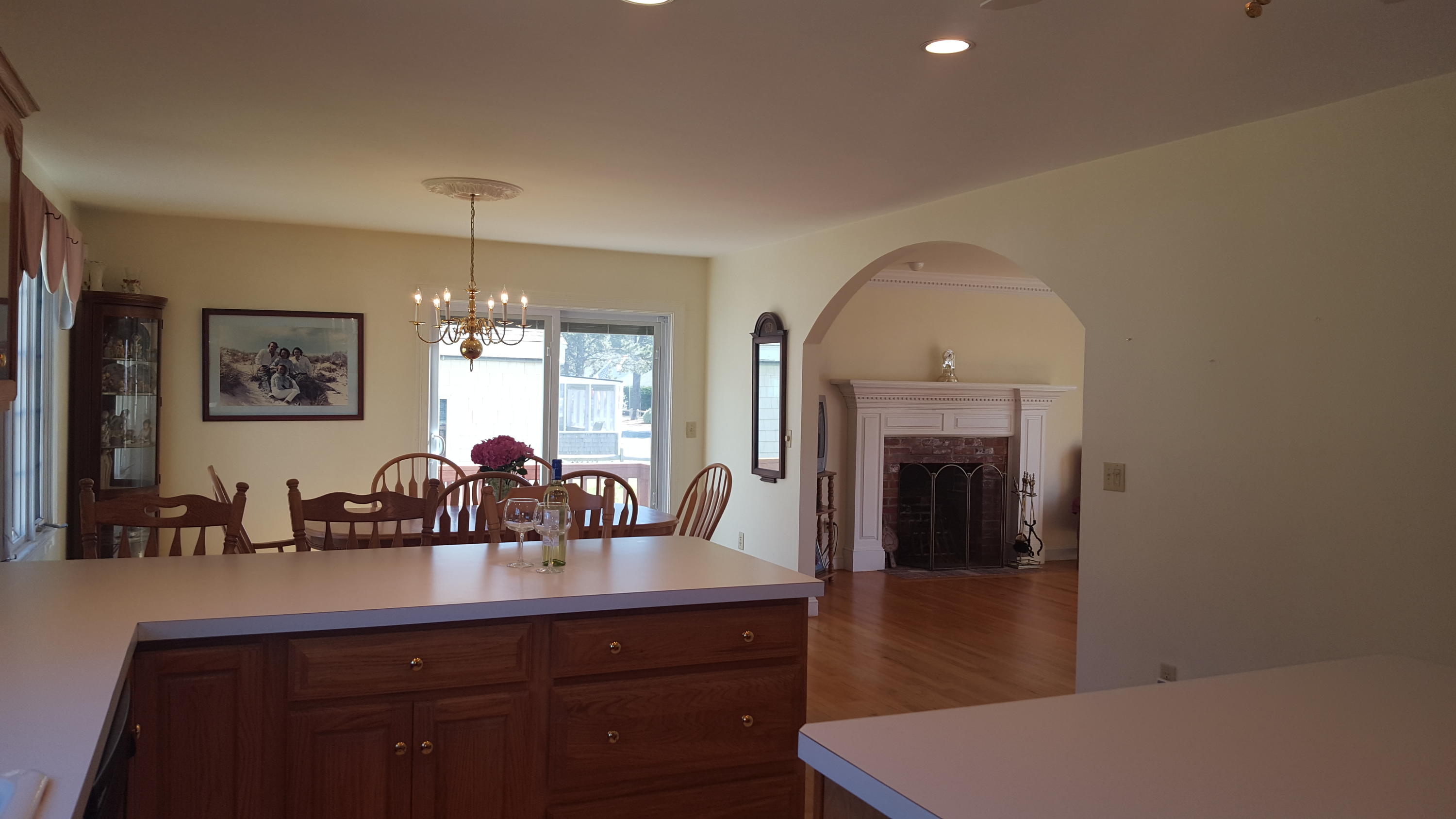 14 Bain Road Dennis Port, MA 02639 - Photo 4 of 22 a living room with furniture and a fireplace