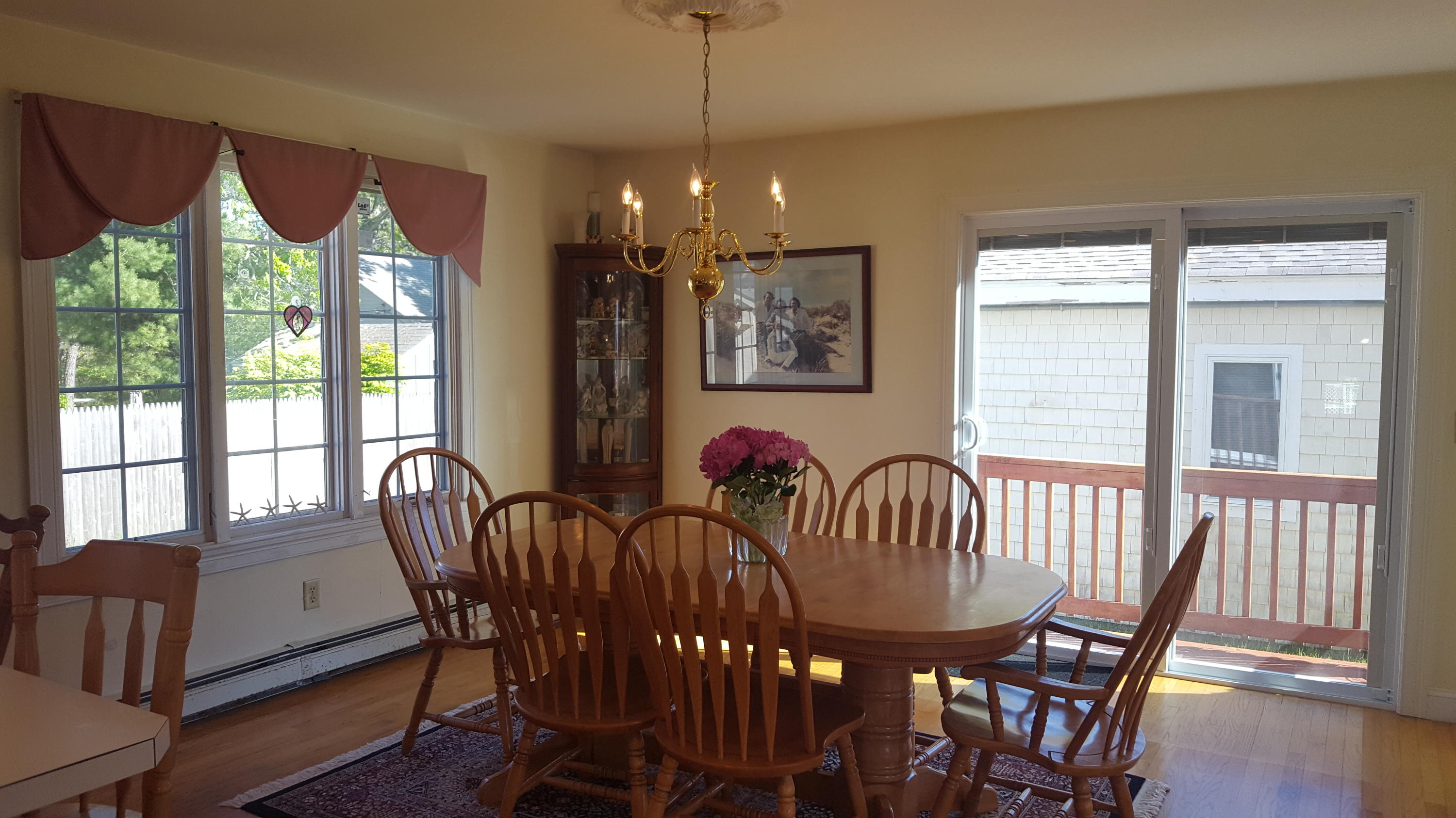 14 Bain Road Dennis Port, MA 02639 - Photo 5 of 22 a view of a dining room with furniture window and outside view