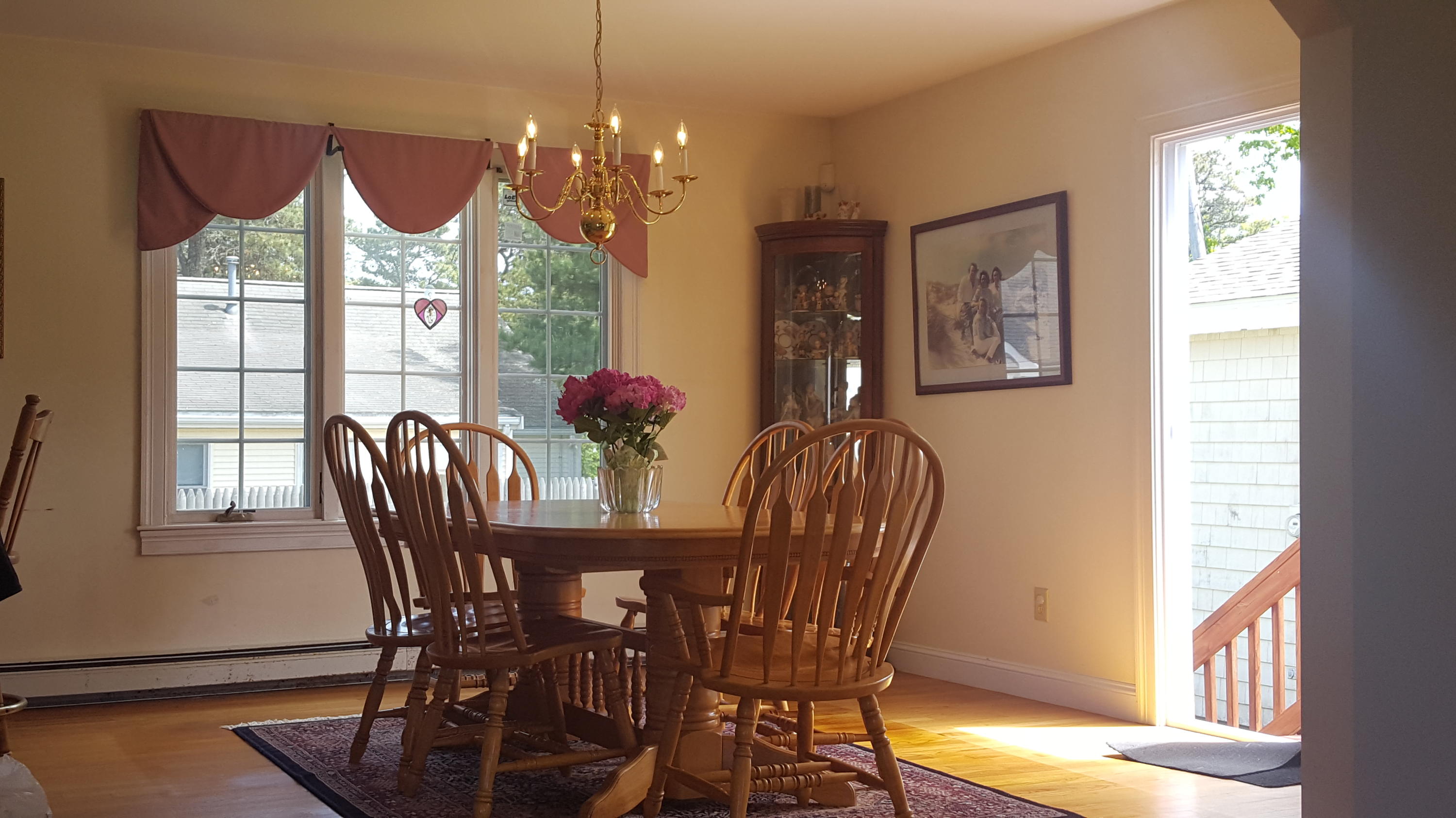 14 Bain Road Dennis Port, MA 02639 - Photo 6 of 22 a view of a dining room with furniture window and wooden floor