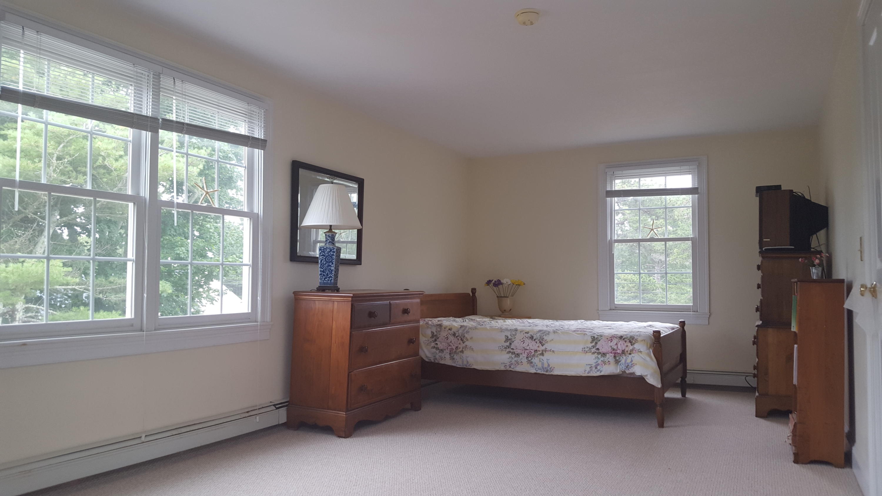 14 Bain Road Dennis Port, MA 02639 - Photo 10 of 22 a bedroom with a bed and a window