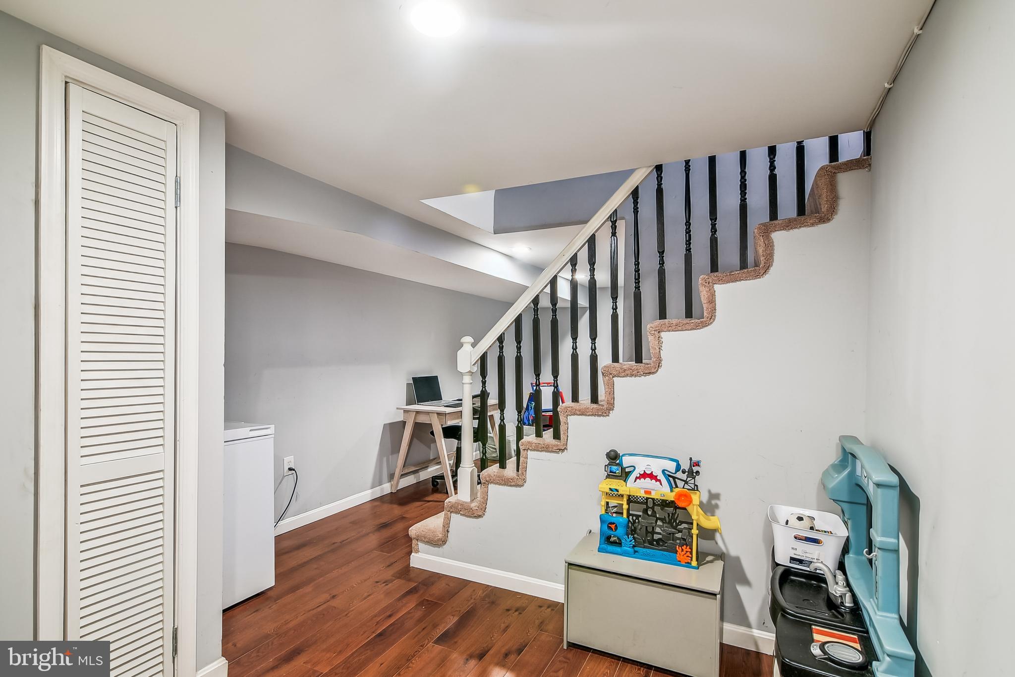 1921 Inverton Road Dundalk, MD 21222 - Photo 27 of 36 a view of entryway and hall with wooden floor