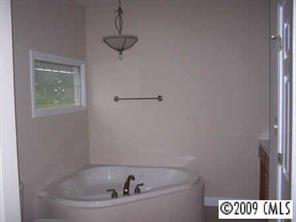 842 Linneys Mill Road Union Grove, NC 28689 - Photo 6 of 8 a bathroom with a bathtub