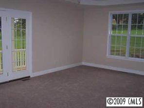 842 Linneys Mill Road Union Grove, NC 28689 - Photo 7 of 8 an empty room with a window