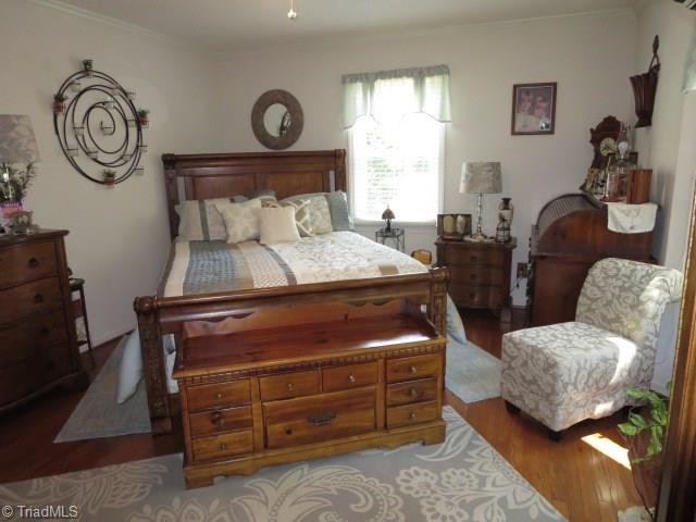 3792 Welcome-Arcadia Road Lexington, NC 27295 - Photo 13 of 30 Master Bedroom - Wood Floors and Crown Molding