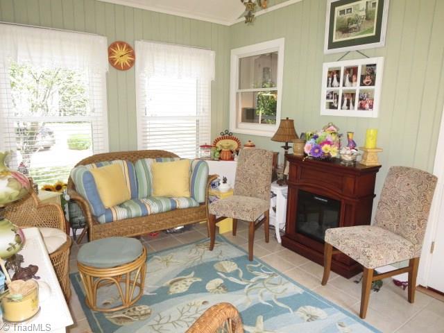 3792 Welcome-Arcadia Road Lexington, NC 27295 - Photo 22 of 30 Sunroom - Electric Fireplace Remains