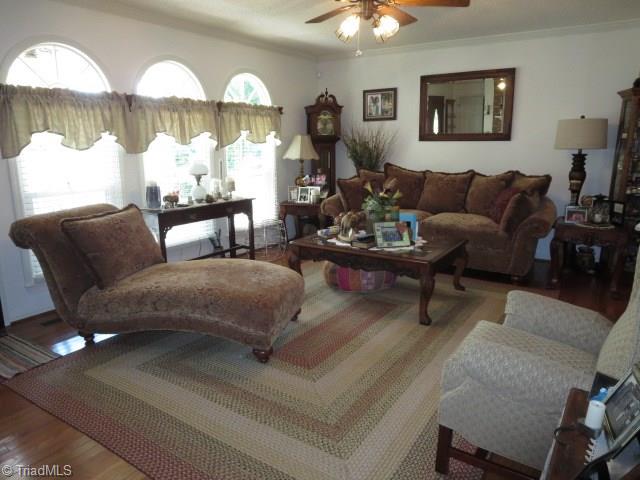 3792 Welcome-Arcadia Road Lexington, NC 27295 - Photo 6 of 30 Living Room - Ceiling Fan and Crown Molding