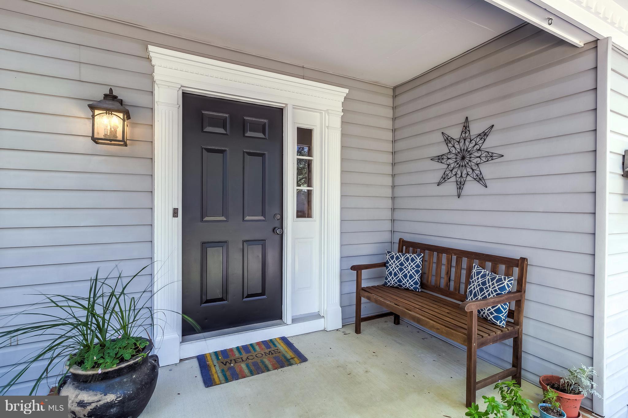 285 Locust Ridge Lane Arnold, MD 21012 - Photo 2 of 24 a view of a bench in the patio