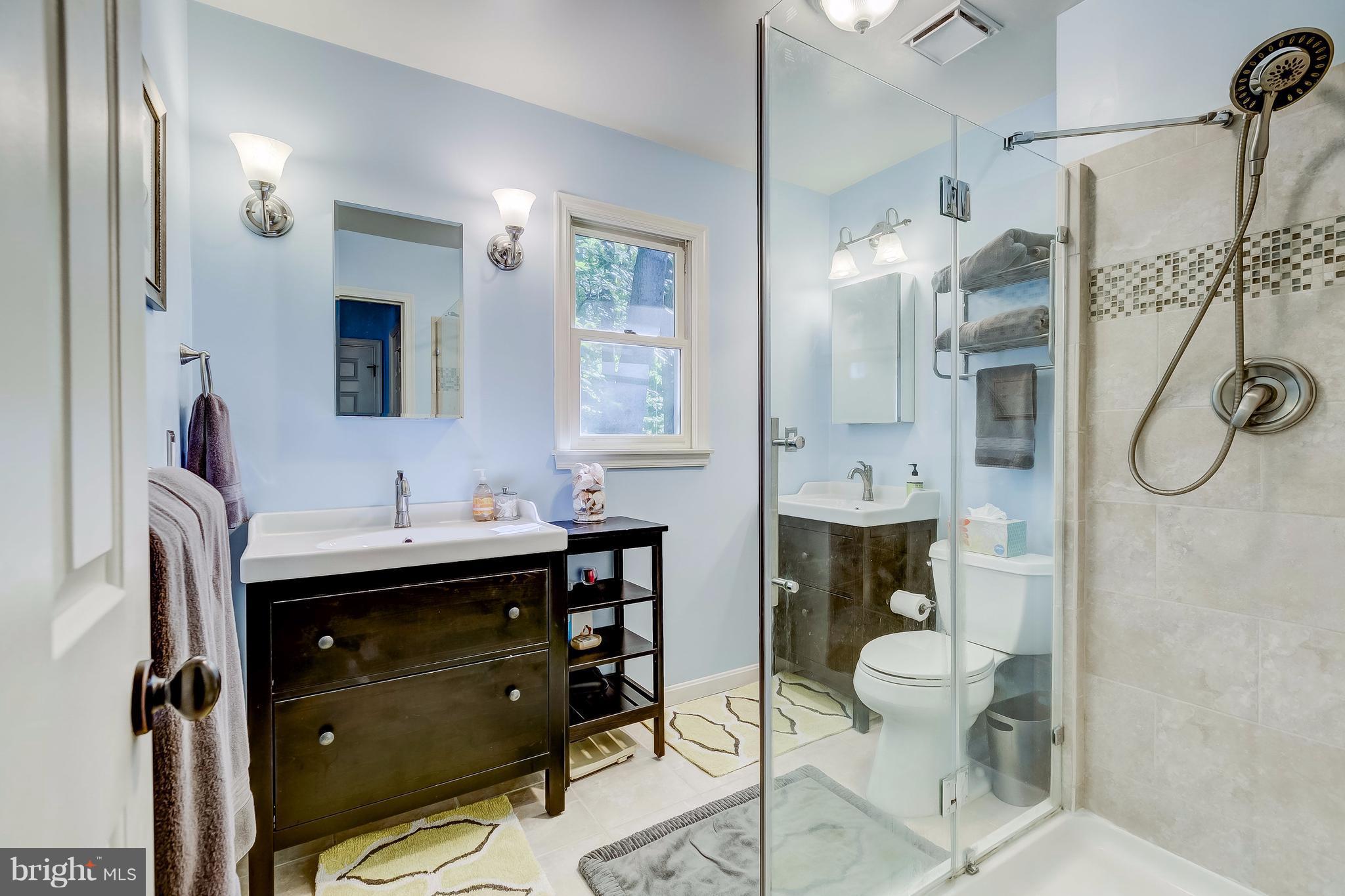 285 Locust Ridge Lane Arnold, MD 21012 - Photo 15 of 24 a bathroom with a sink a toilet and shower