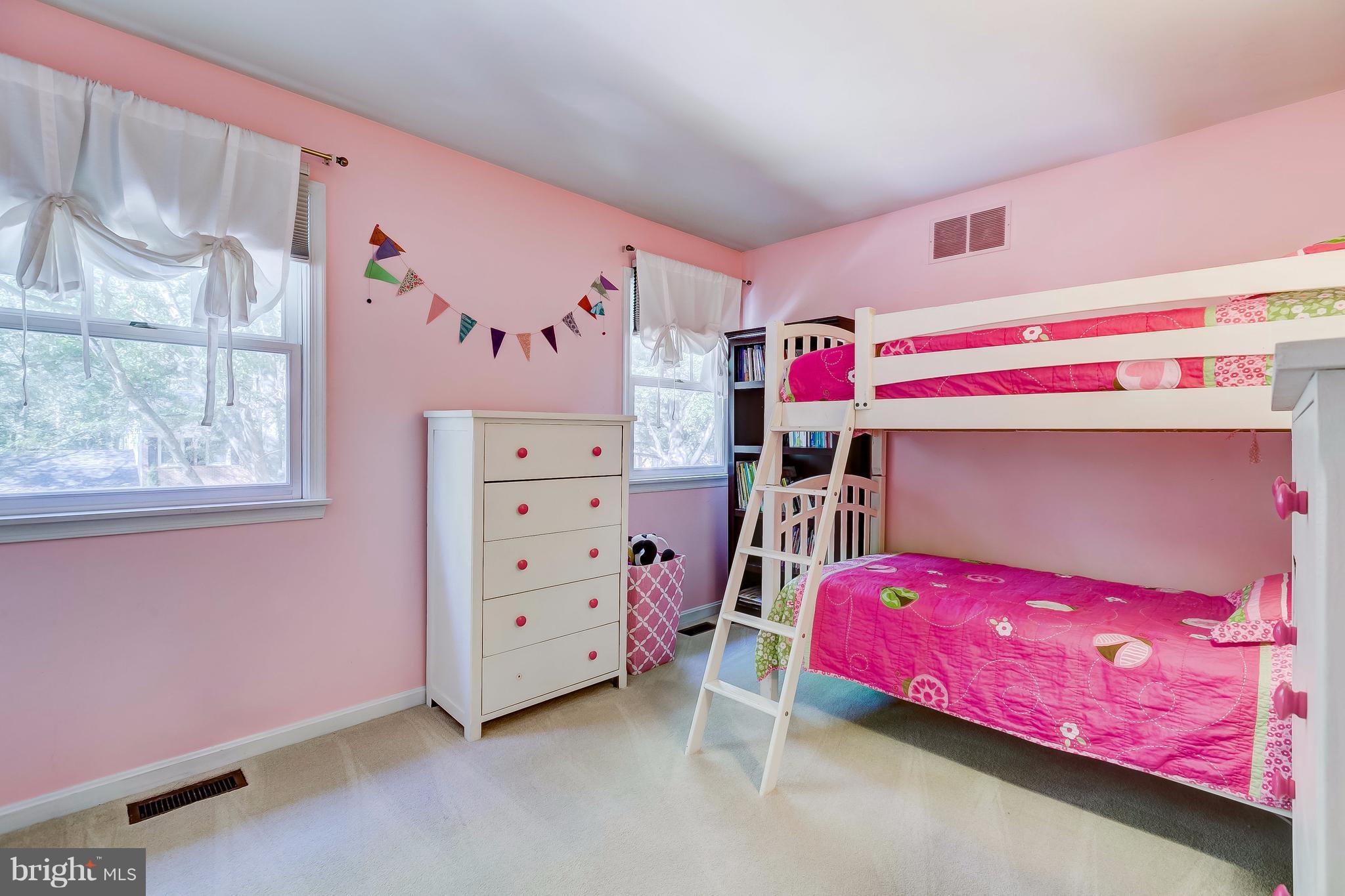 285 Locust Ridge Lane Arnold, MD 21012 - Photo 17 of 24 a bedroom with a bed and a dresser
