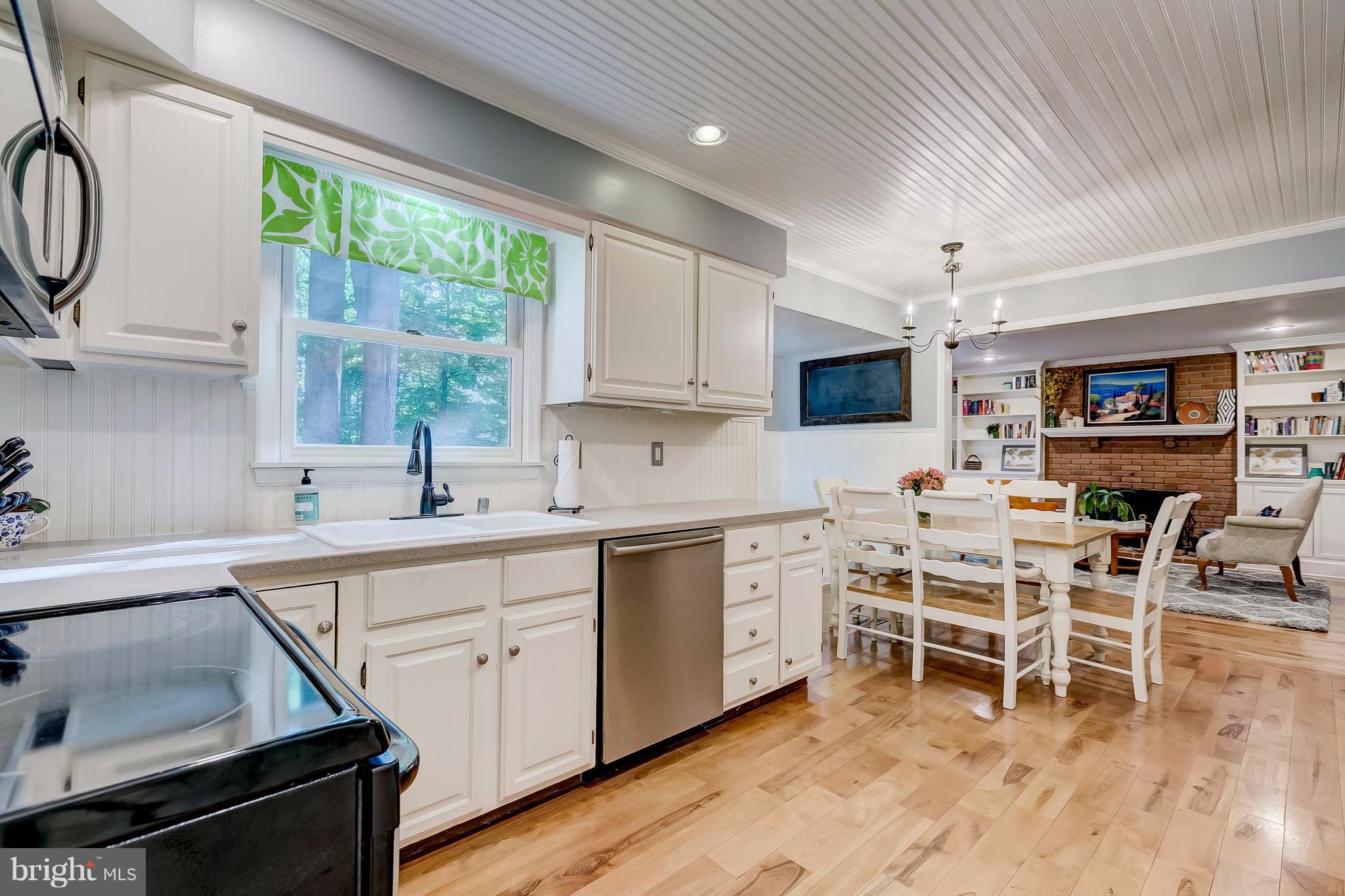285 Locust Ridge Lane Arnold, MD 21012 - Photo 4 of 24 a kitchen with a sink cabinets and window