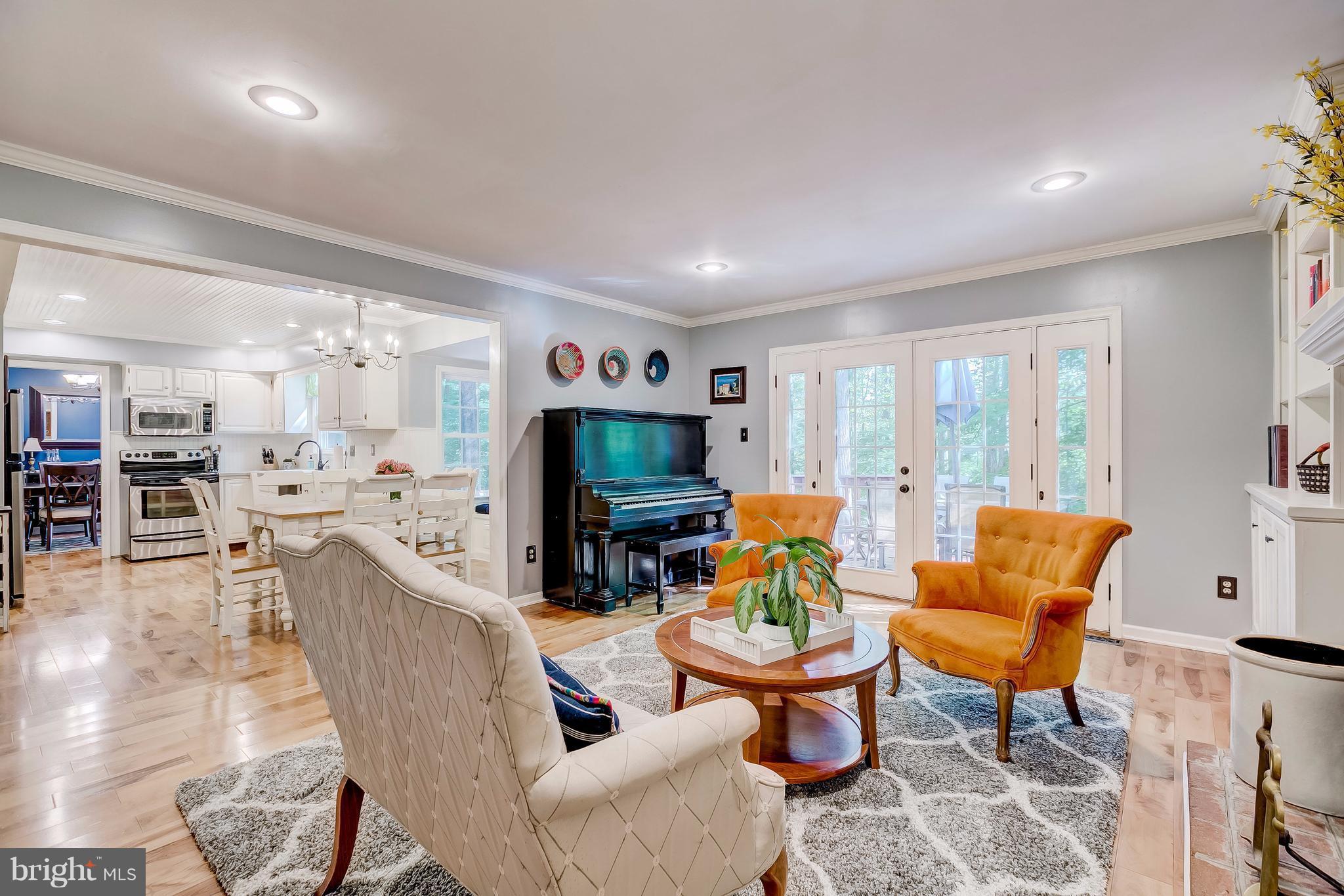 285 Locust Ridge Lane Arnold, MD 21012 - Photo 5 of 24 a living room with furniture and a flat screen tv