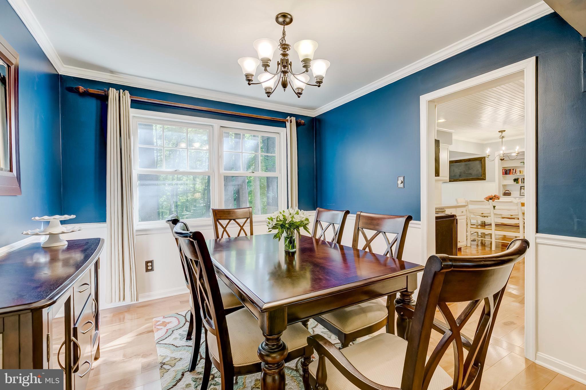 285 Locust Ridge Lane Arnold, MD 21012 - Photo 10 of 24 a view of a dining room with furniture window and outside view