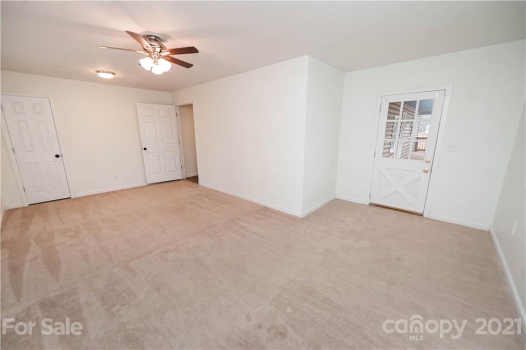 4266 Big Island Road Rutherfordton, NC 28139 - Photo 22 of 36 a view of an empty room with a fan