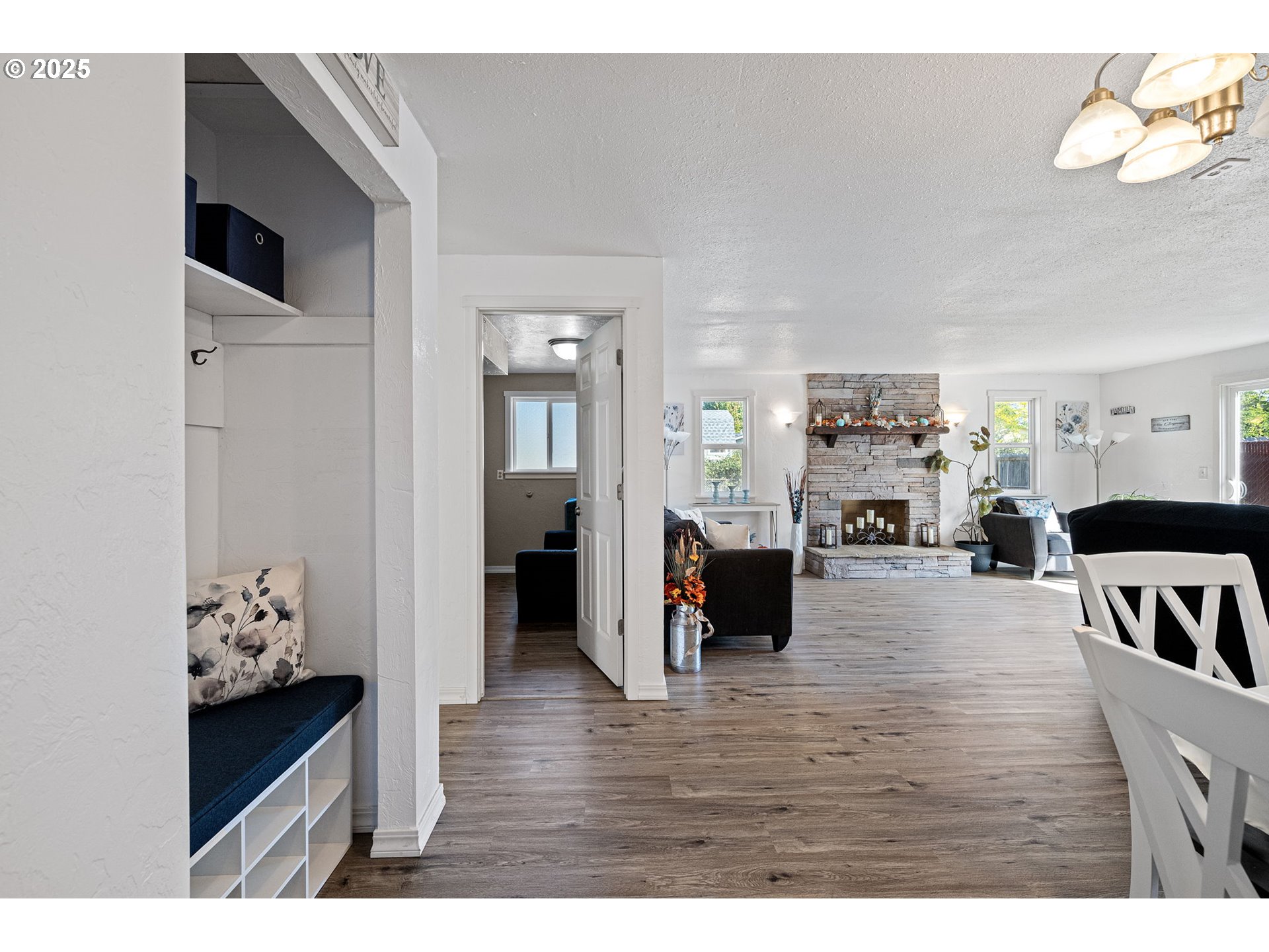 2105 16th Street Florence, OR 97439 - Photo 21 of 48 a living room with furniture and a wooden floor