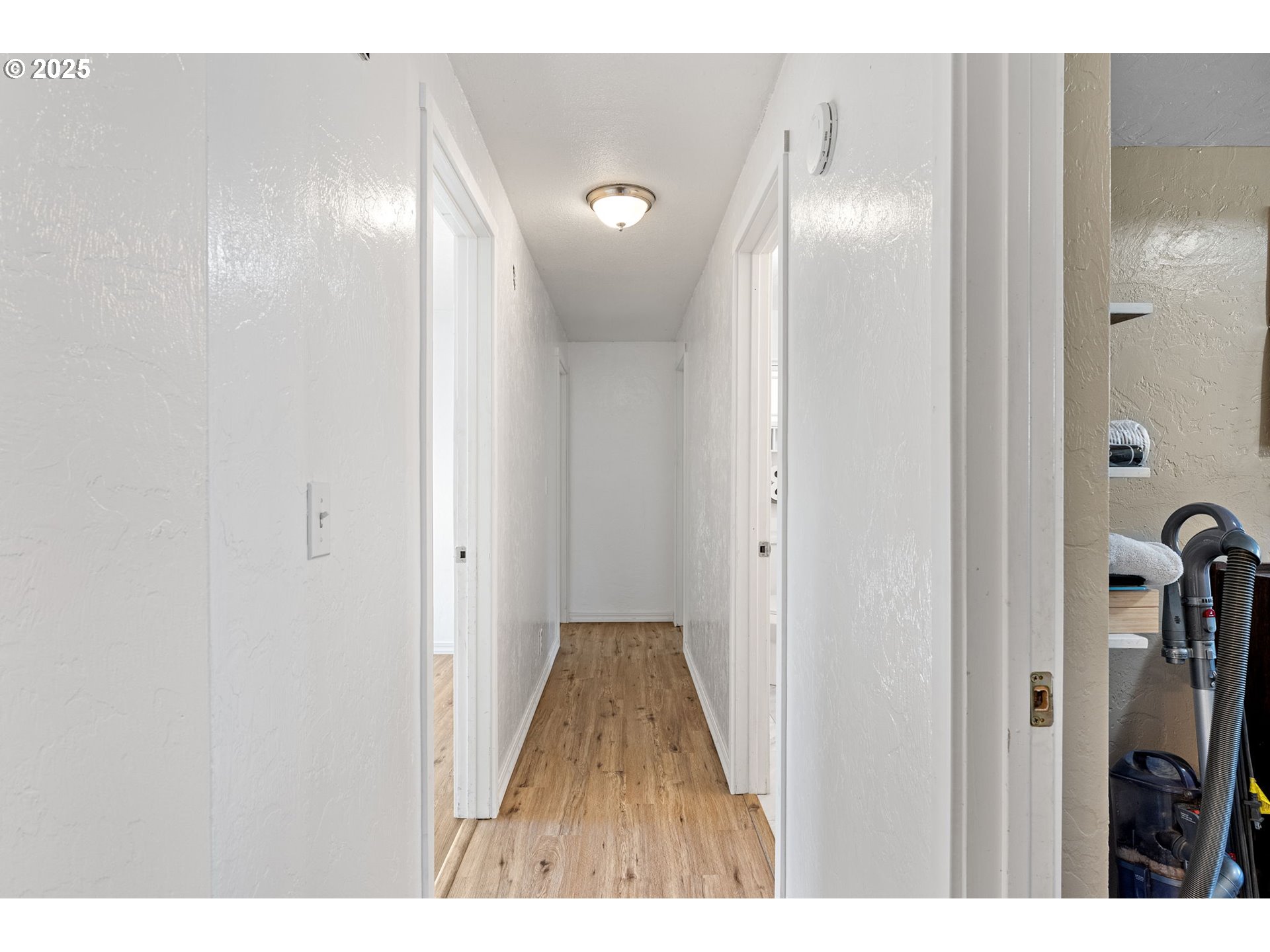 2105 16th Street Florence, OR 97439 - Photo 22 of 48 a view of a room with wooden floor