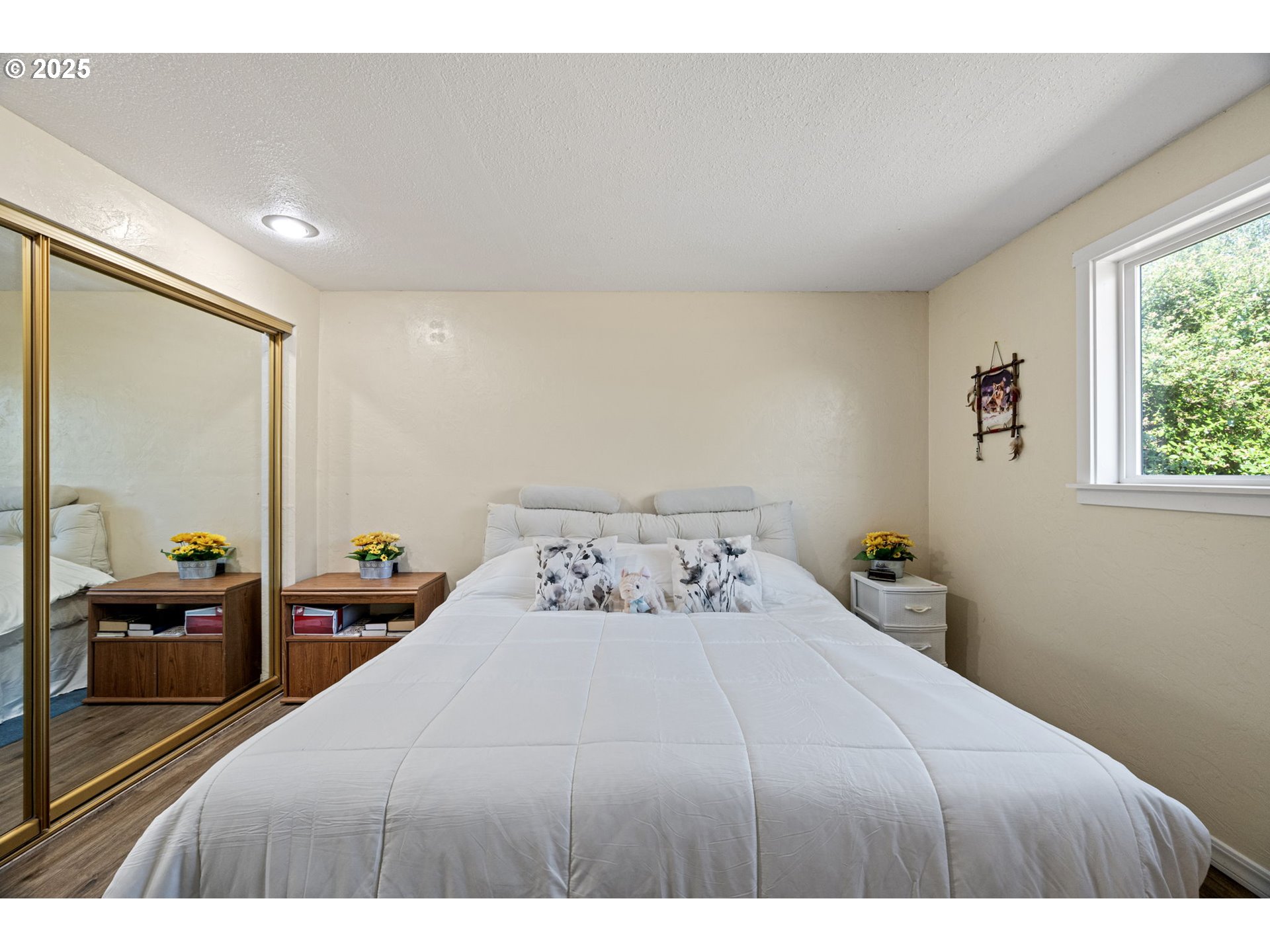 2105 16th Street Florence, OR 97439 - Photo 32 of 48 a bedroom with a bed and large windows