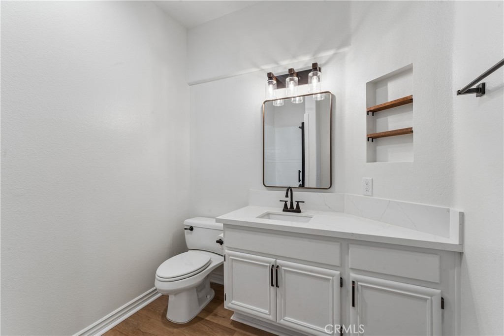 26023 Salinger Lane Stevenson Ranch, CA 91381 - Photo 12 of 35 Downstairs bathroom featuring a full shower.