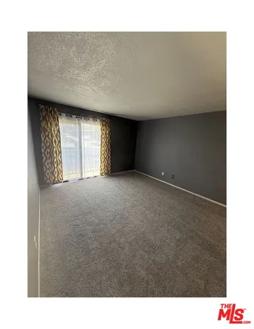 a open hall with a fireplace