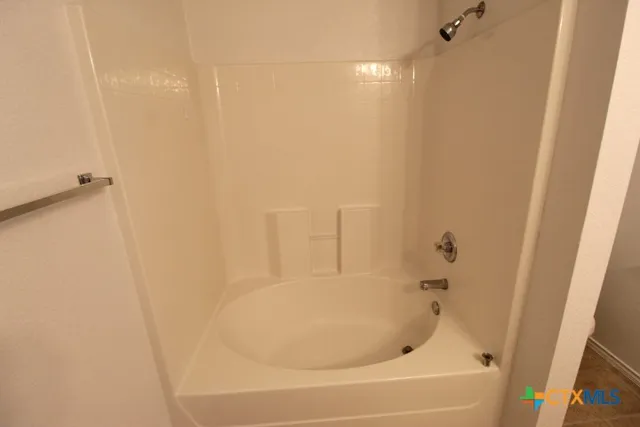 a bathroom with a bathtub