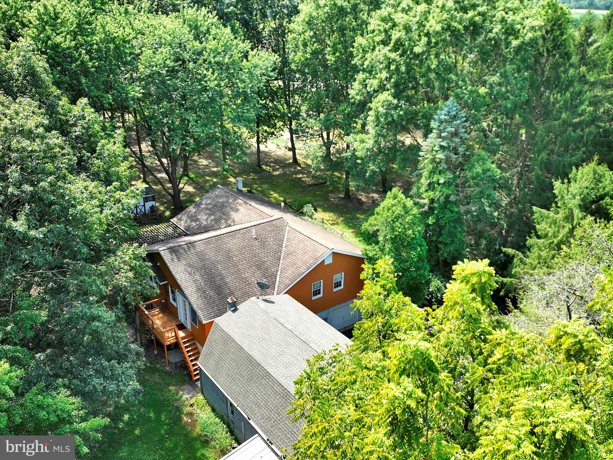 321 Wolf Creek Road Bernville, PA 19506 - Photo 1 of 49 an aerial view of a house with swimming pool and garden