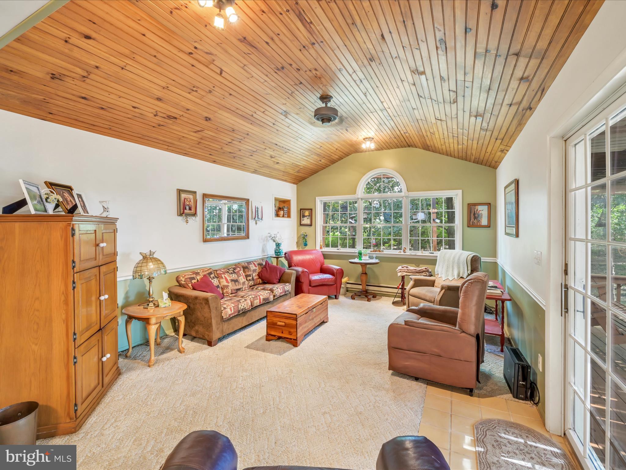 321 Wolf Creek Road Bernville, PA 19506 - Photo 12 of 49 a living room with furniture and a large window