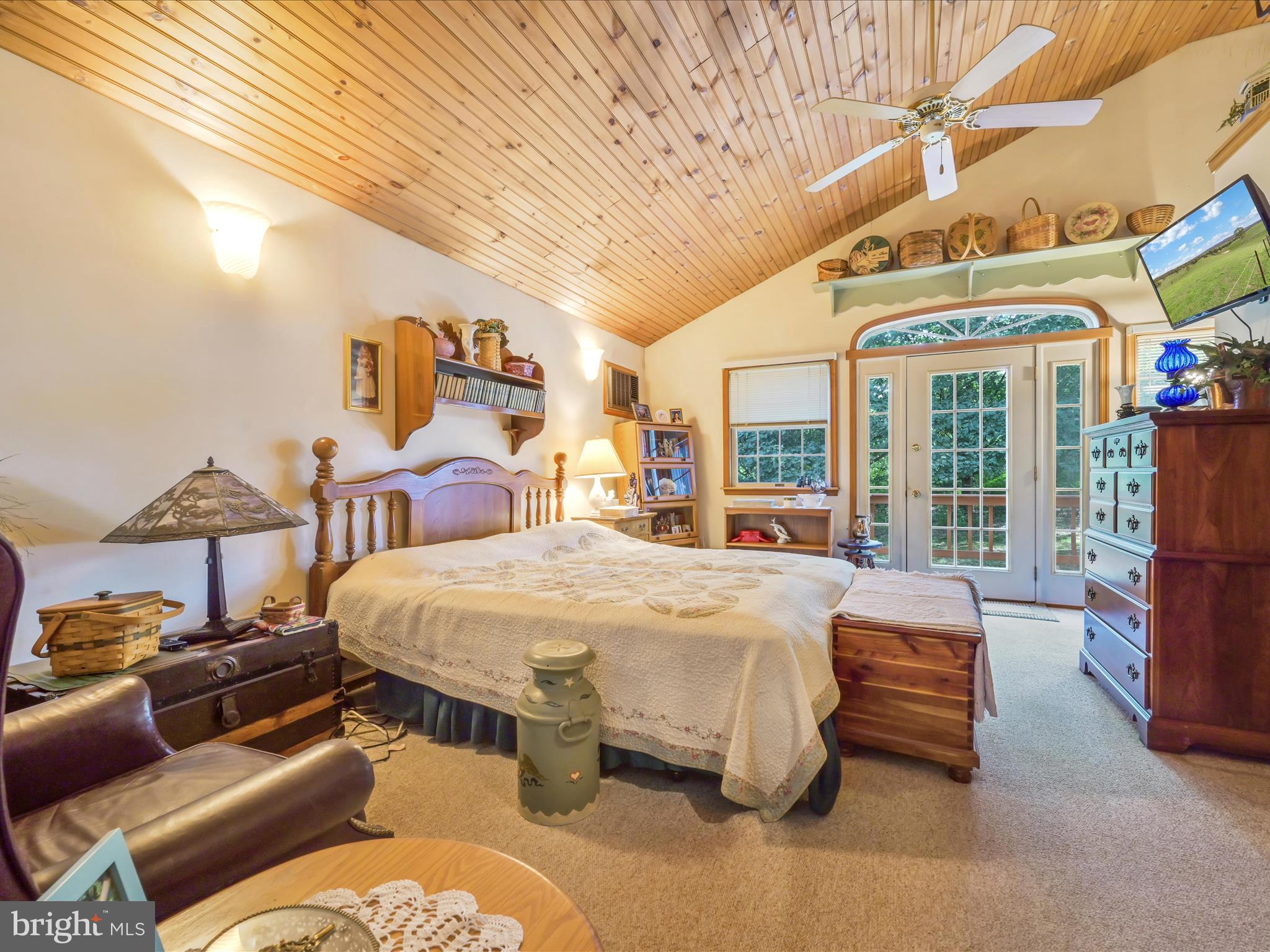 321 Wolf Creek Road Bernville, PA 19506 - Photo 14 of 49 a bed room with a bed and a chair