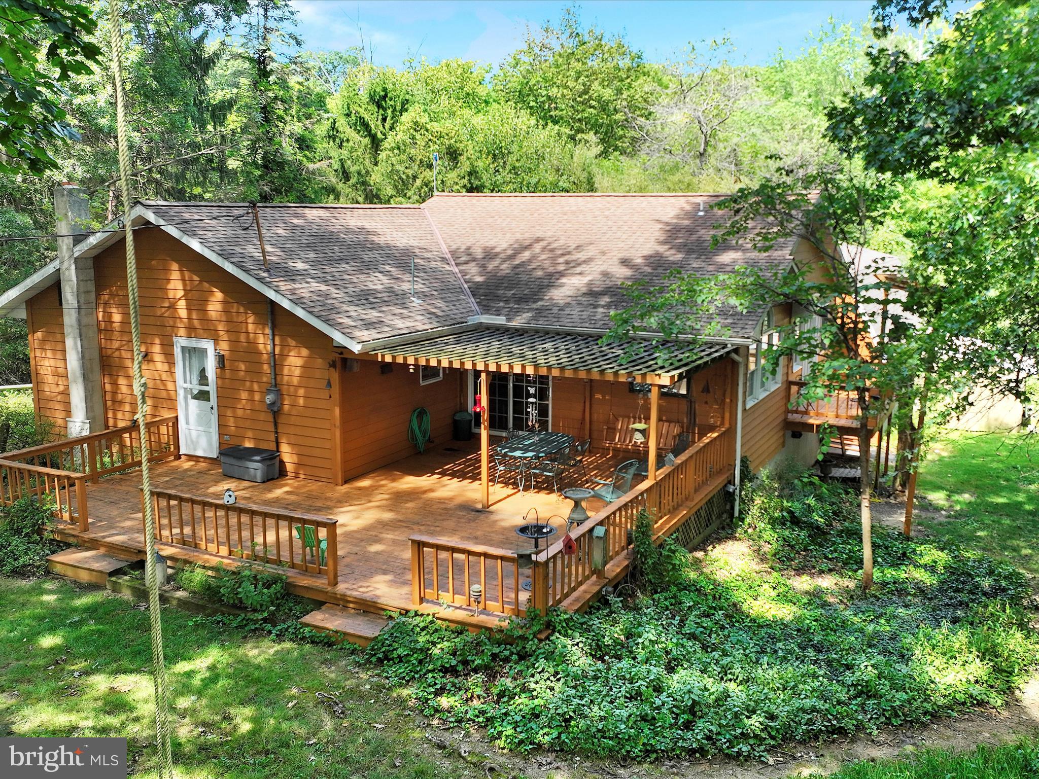 321 Wolf Creek Road Bernville, PA 19506 - Photo 2 of 49 a backyard of a house with lots of green space