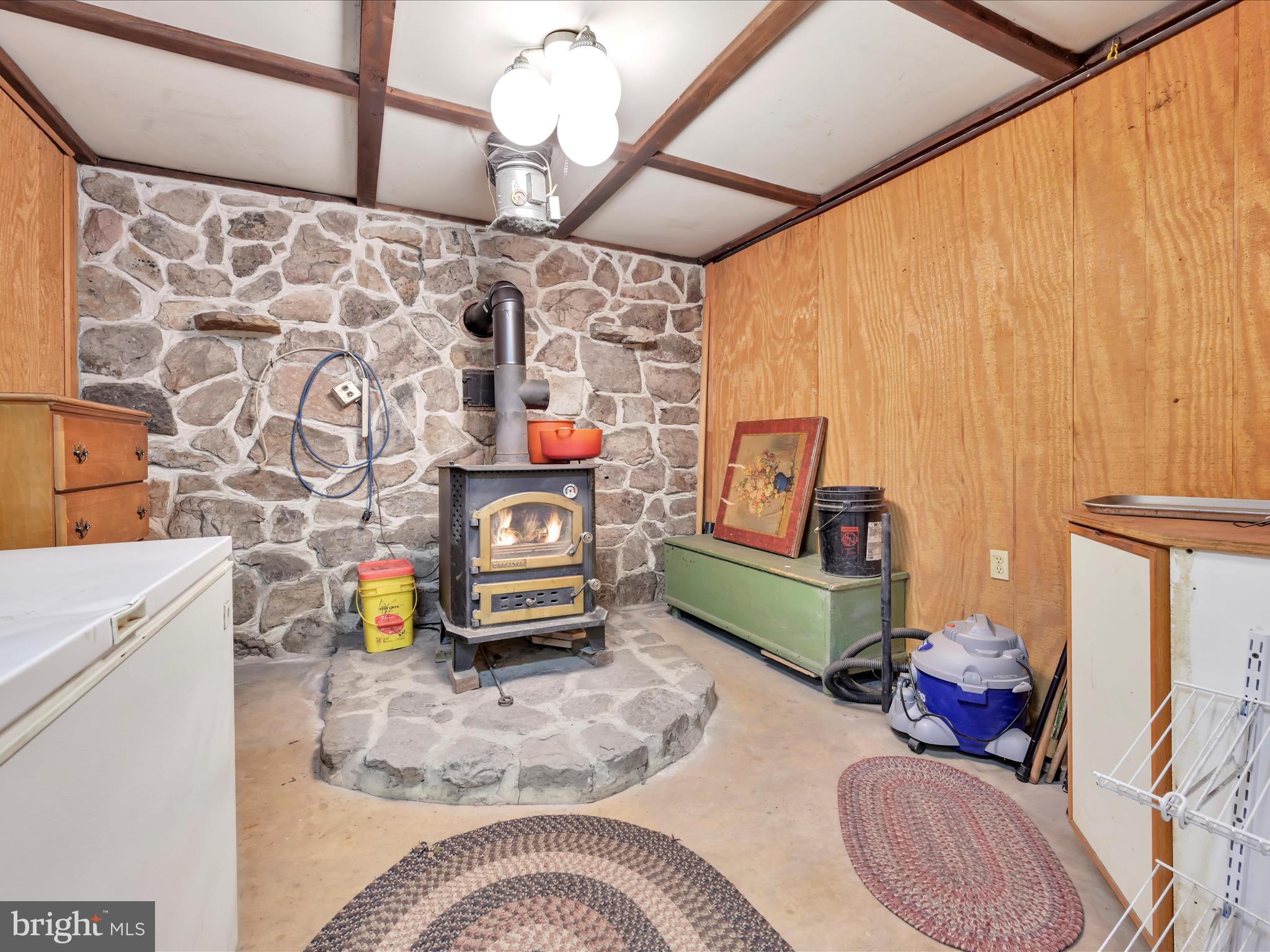 321 Wolf Creek Road Bernville, PA 19506 - Photo 22 of 49 a living room with furniture and a wooden floor