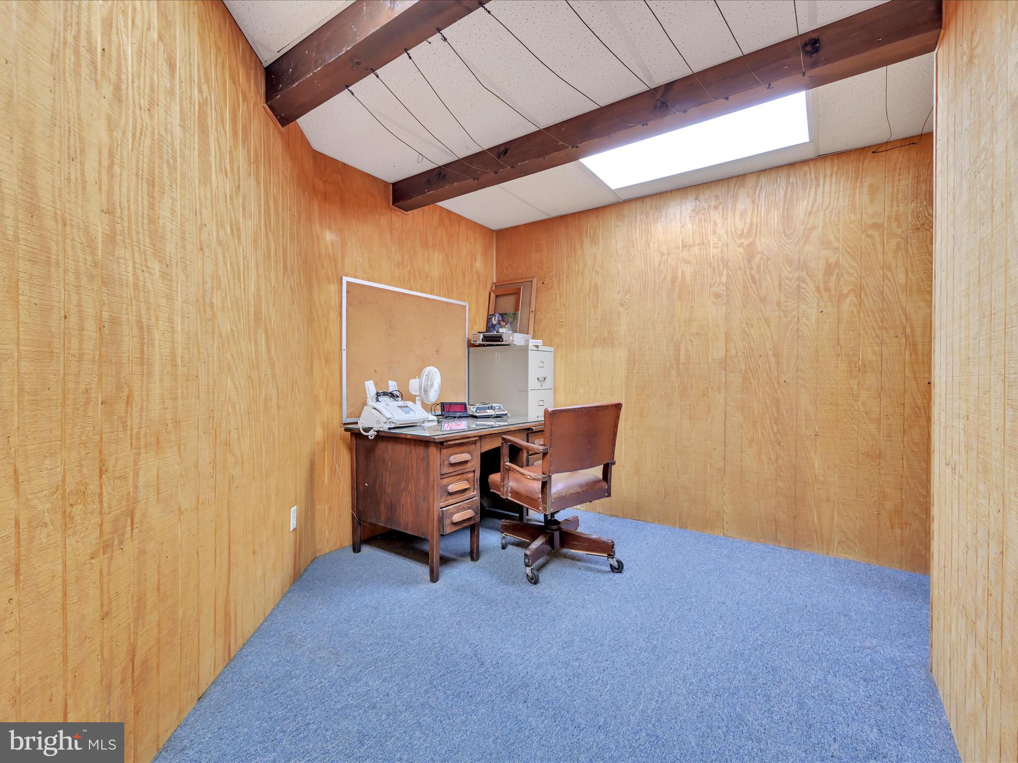 321 Wolf Creek Road Bernville, PA 19506 - Photo 28 of 49 a view of a workspace with furniture and a window