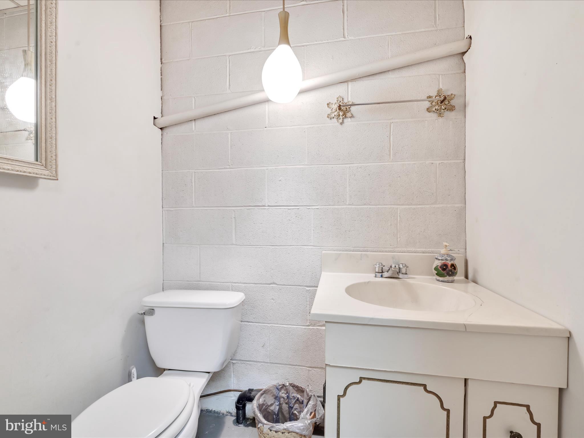 321 Wolf Creek Road Bernville, PA 19506 - Photo 29 of 49 a bathroom with a toilet sink and shower