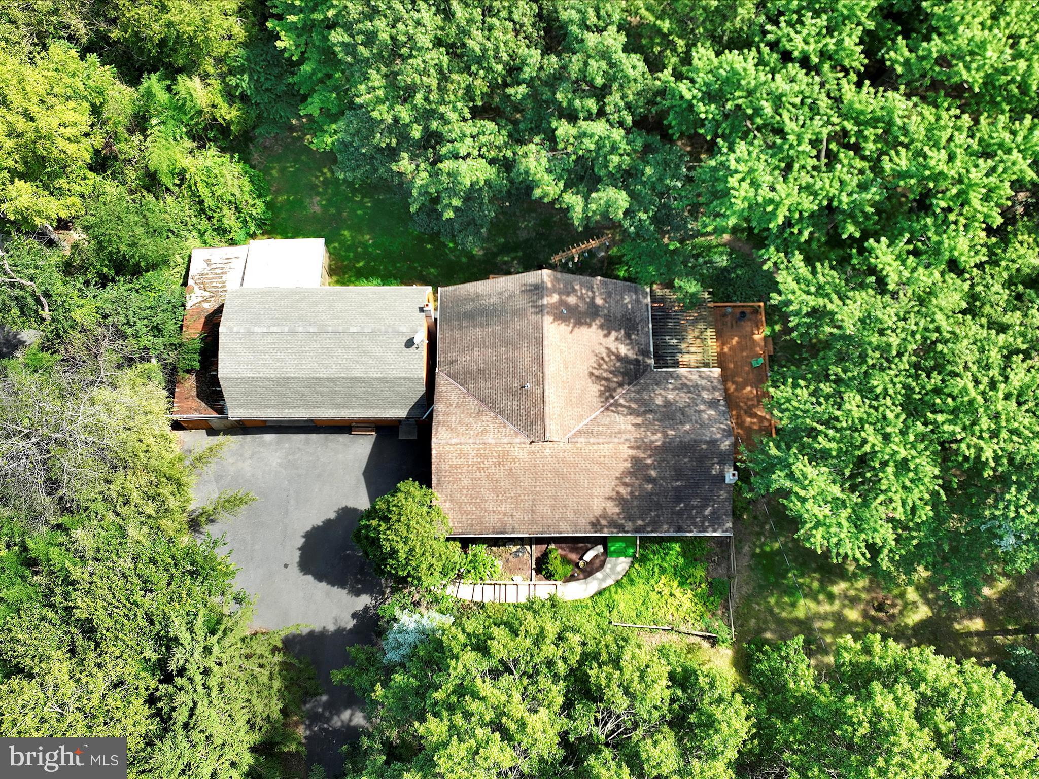 321 Wolf Creek Road Bernville, PA 19506 - Photo 3 of 49 an aerial view of a house with yard and swimming pool